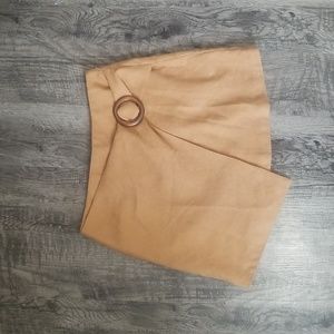 Tan wrap skirt with wooden attachment
